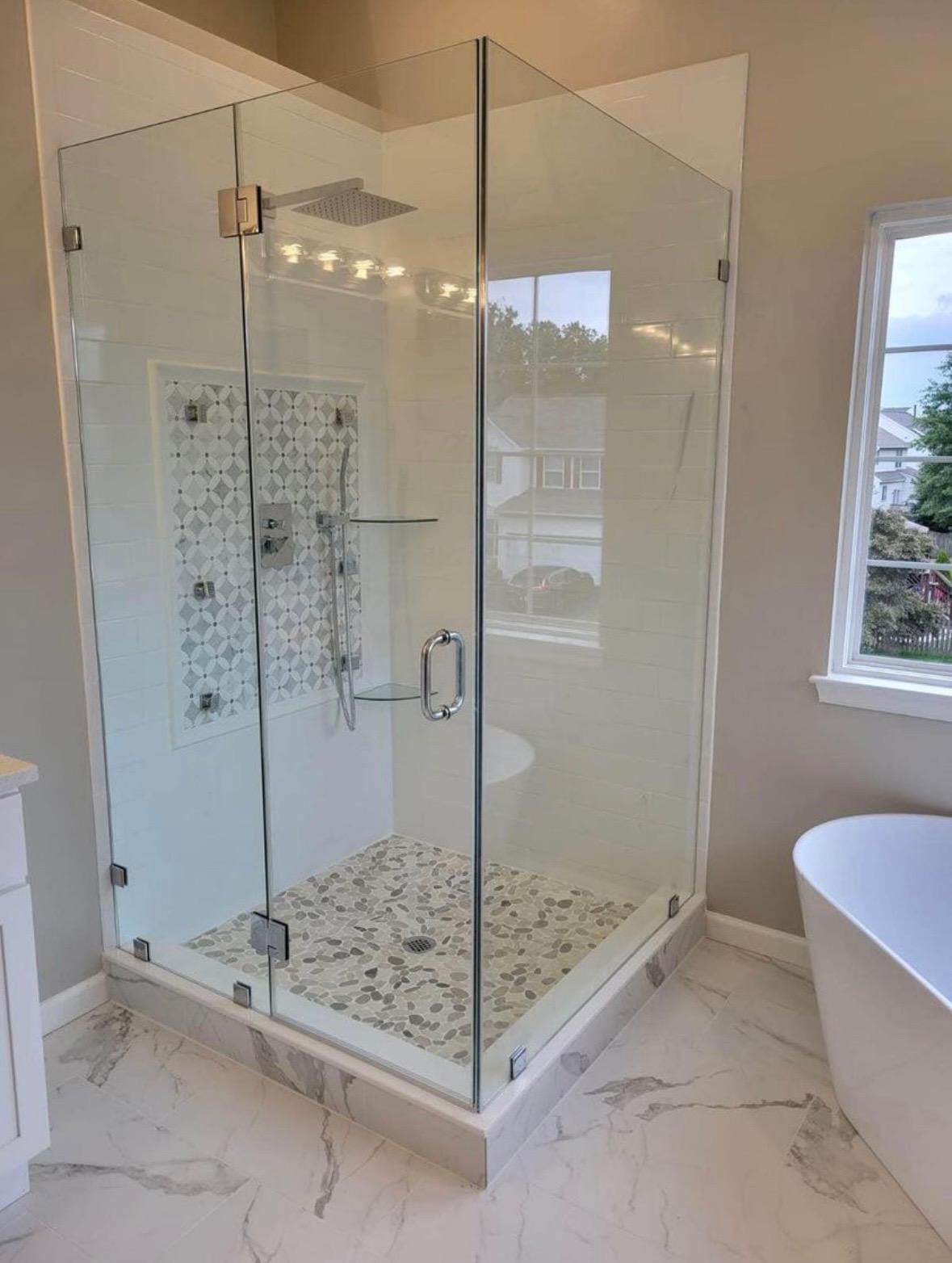 Glass enclosed walk-in shower